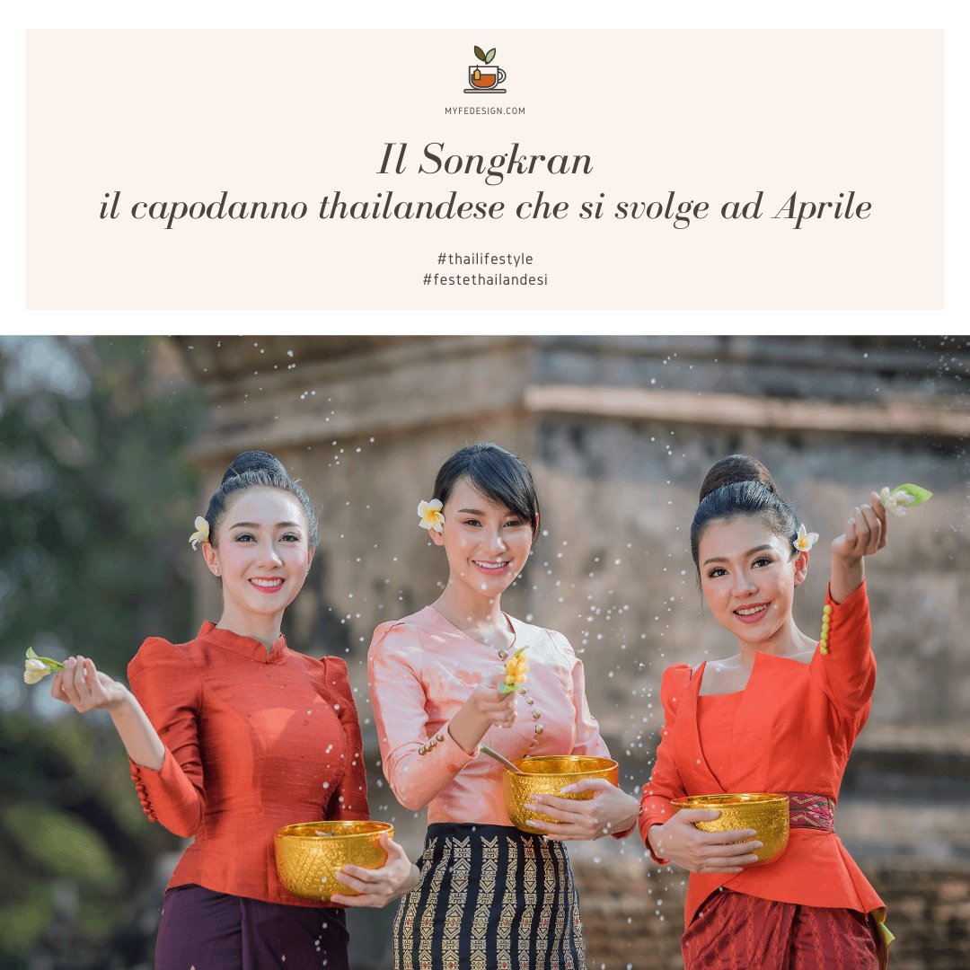 3 donne thailandesi in costume tradizionale intende a festeggiare il songkran, cioè il capodanno thailandese che si svolge dal 13 al 15 aprile